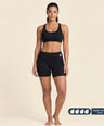 Woman wearing FreeFlowa black period boxer shorts for super heavy flow