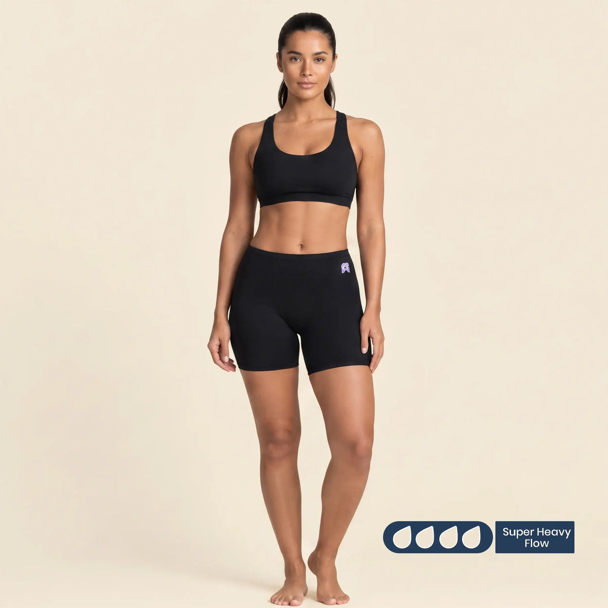 Woman wearing FreeFlowa black period boxer shorts for super heavy flow